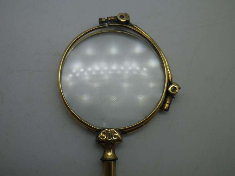 Vintage Gold Plated spring loaded lorgnette with brooch attachment. Made in Germany
