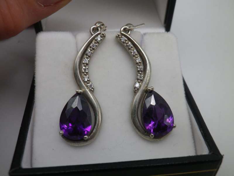 925 Sterling silver drop earrings with pearcut purple stones & 7 cubic zirconias. 3.5cm 6.6g
