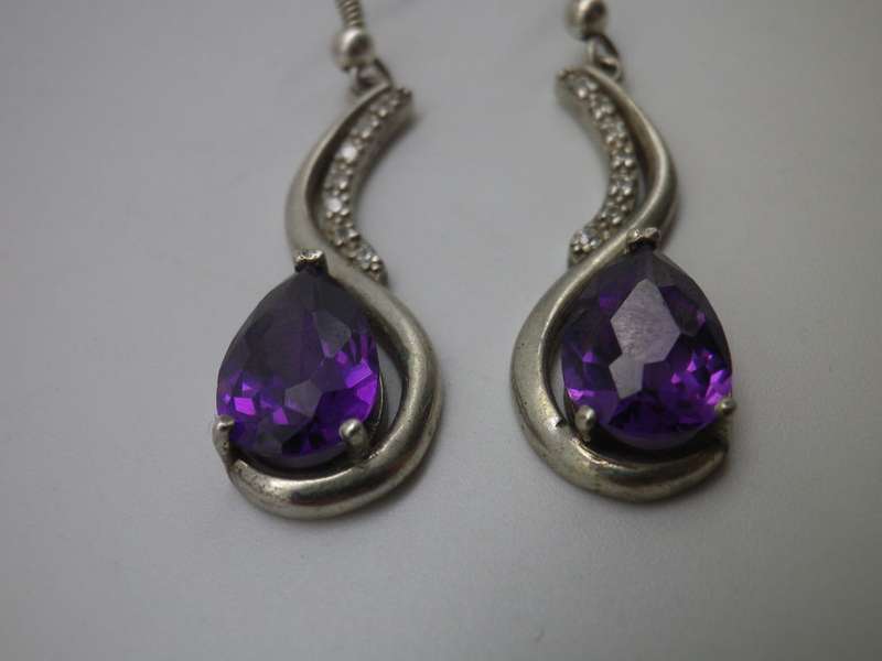925 Sterling silver drop earrings with pearcut purple stones & 7 cubic zirconias. 3.5cm 6.6g
