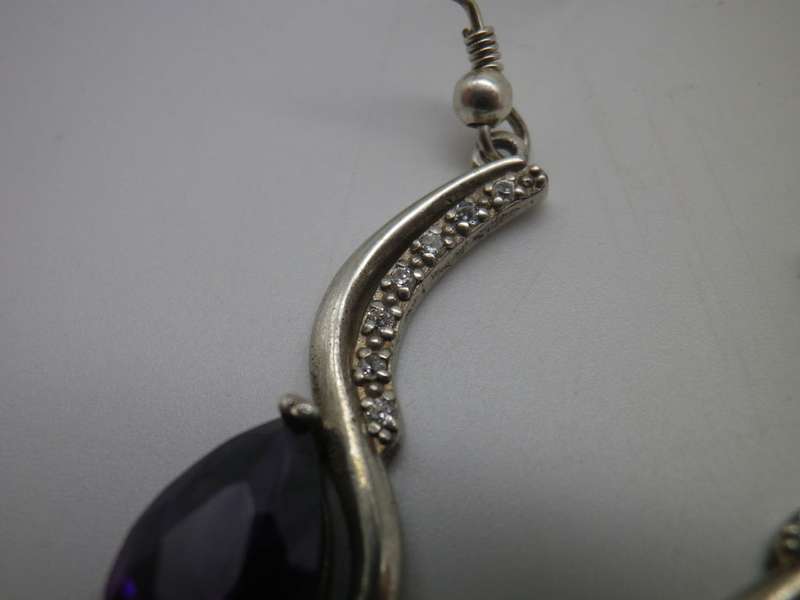 925 Sterling silver drop earrings with pearcut purple stones & 7 cubic zirconias. 3.5cm 6.6g