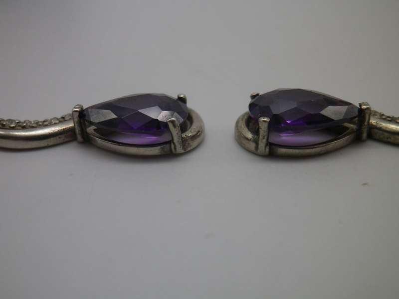 925 Sterling silver drop earrings with pearcut purple stones & 7 cubic zirconias. 3.5cm 6.6g
