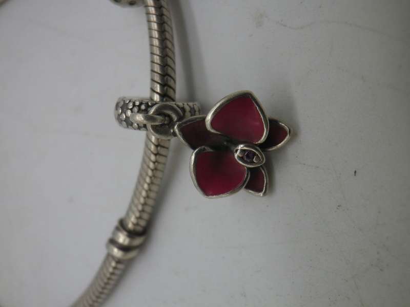 PANDORA Sterling Silver bracelet with 2 charms: cubic zirconia studded heart & enamel orchid. 20cm