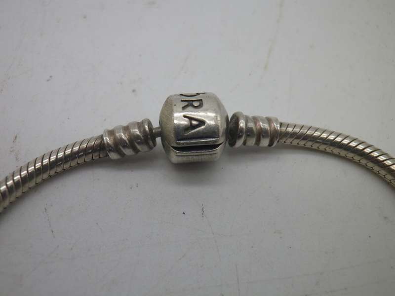 PANDORA Sterling Silver bracelet with 2 charms: cubic zirconia studded heart & enamel orchid. 20cm