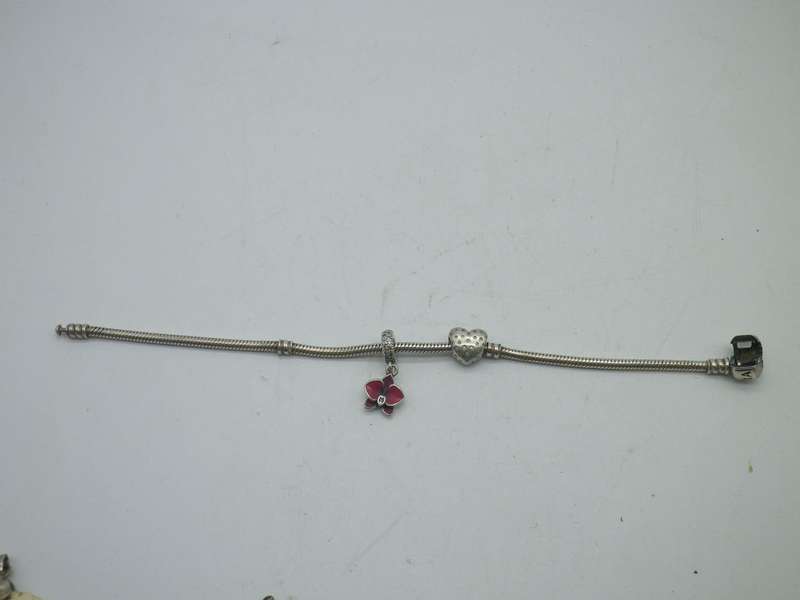 PANDORA Sterling Silver bracelet with 2 charms: cubic zirconia studded heart & enamel orchid. 20cm