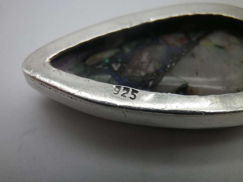 Sterling Silver Hand made Vintage pendant with beautiful detail and semi precious stone.