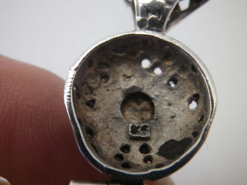 Sterling Silver Hand made Vintage pendant with beautiful detail and semi precious stone.