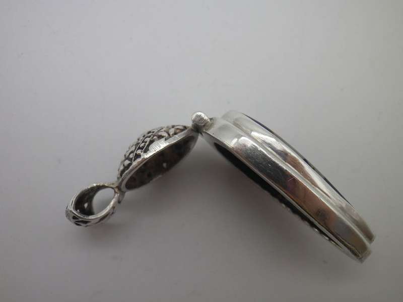 Sterling Silver Hand made Vintage pendant with beautiful detail and semi precious stone.