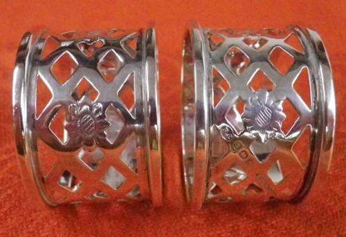 Most lovely pair of hallmarked BIRMINGHAM, 1920 silver napkin rings. Lovely design.