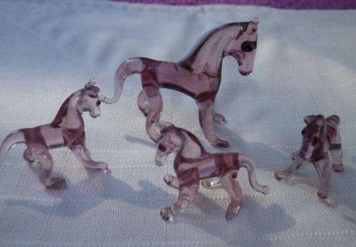GLORIOUS set of 4 purple & clear handblown glass miniature horses. Mare and foals