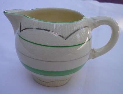 CLARICE CLIFF c 1940S NEWPORT POTTERIES CREAM, GREEN & WHITE MILK JUG REG:840076