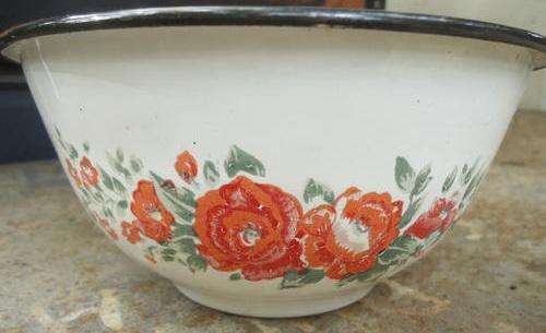 Small white vintage enamel round bowl with pretty red & orange flowers & black trim