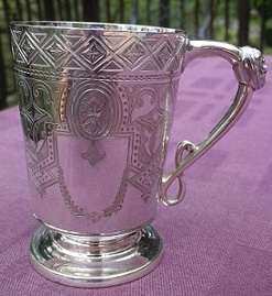 EXQUISITE ARTE NOUVEAU SILVER-PLATED CHRISTENING MUG.