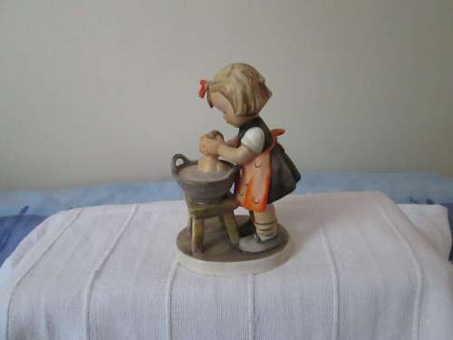 GOEBEL FIGURINE  MADE IN W GERMANY-  GIRL WASHING THE BABY IN A BUCKET