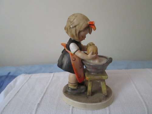 GOEBEL FIGURINE  MADE IN W GERMANY-  GIRL WASHING THE BABY IN A BUCKET