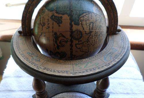 VINTAGE WOODEN TABLE TOP GLOBE. BEAUTIFUL CONDITION AND HIGHLY COLLECTABLE.  MADE IN ITALY