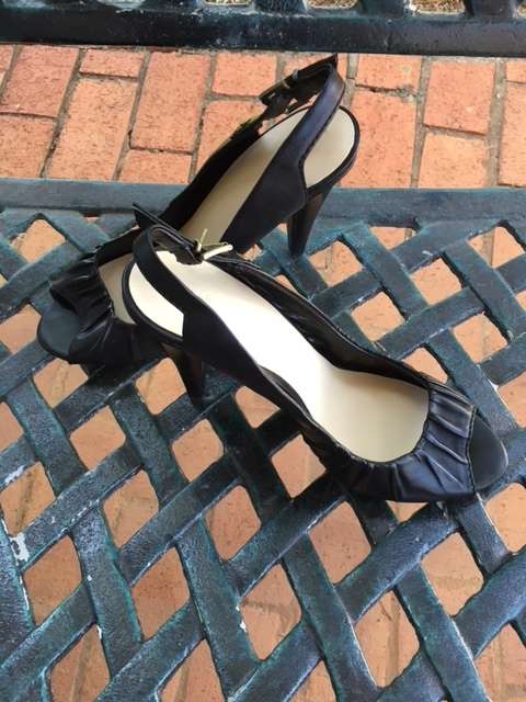 Black peep-toe sling back heels