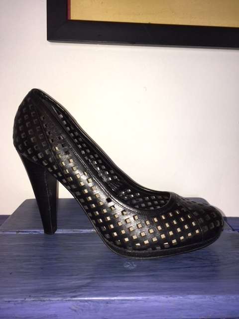 High black heels featuring small square cut outs