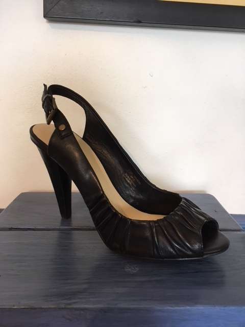 Black peep-toe sling back heels