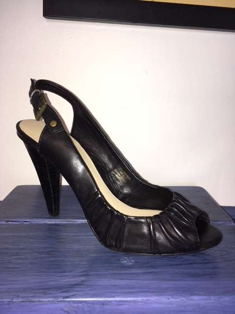 Black peep-toe sling back heels