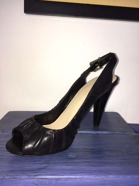 Black peep-toe sling back heels