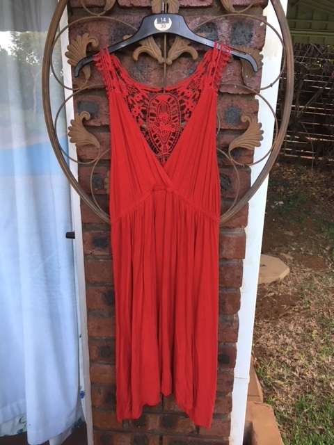 Red summer dress with crochet back