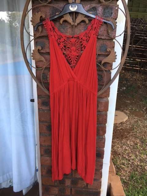 Red summer dress with crochet back