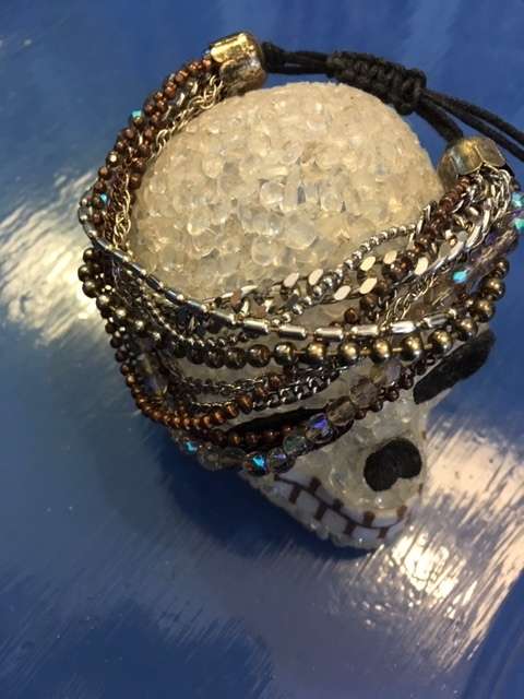 Multi-chain drawstring bracelet with iridescent beading