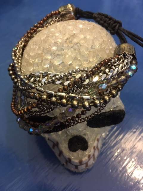 Multi-chain drawstring bracelet with iridescent beading