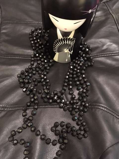 Black multi strand geometric beaded necklace