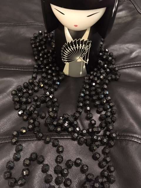 Black multi strand geometric beaded necklace