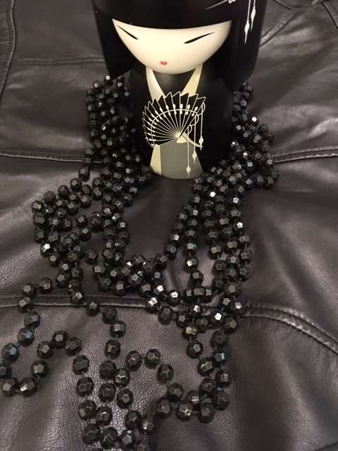 Black multi strand geometric beaded necklace