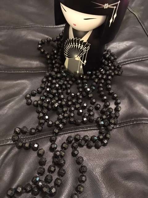 Black multi strand geometric beaded necklace