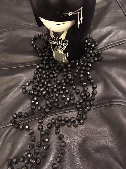 Black multi strand geometric beaded necklace
