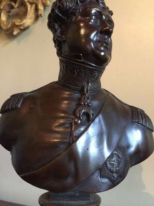 A BRONZE BUST OF GEORGE IV