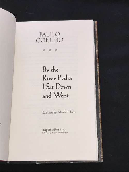 BY THE RIVER PIEDRA I SAT DOWN & WEPT BY PAULO COELHO 1ST EDITION