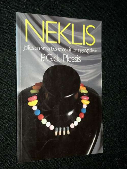 NEKLIS JOLLIES EN SMARTIES SOOS UIT EN INGERYG DEUR P.G. DU PLESSIS