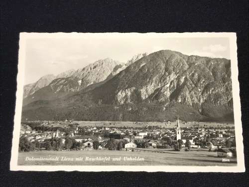 1940 DOLOMITENSTADT LIENZ AUSTRIA MIT RAUCHKOFEL UND UNHOLDEN UNUSED PHOTO POSTCARD