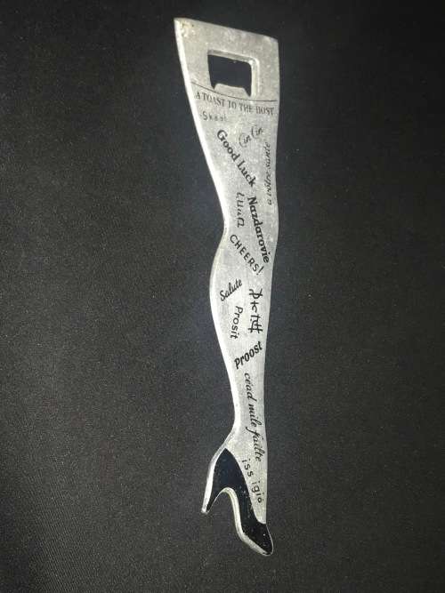 VINTAGE LADIES LEG A TOAST TO THE HOST BOTTLE OPENER