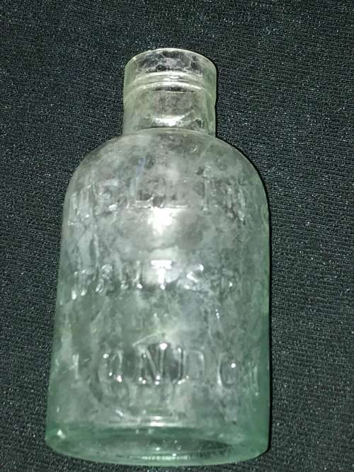 ANTIQUE MELLIN INFANT`S FOOD BOTTLE FROM LONDON