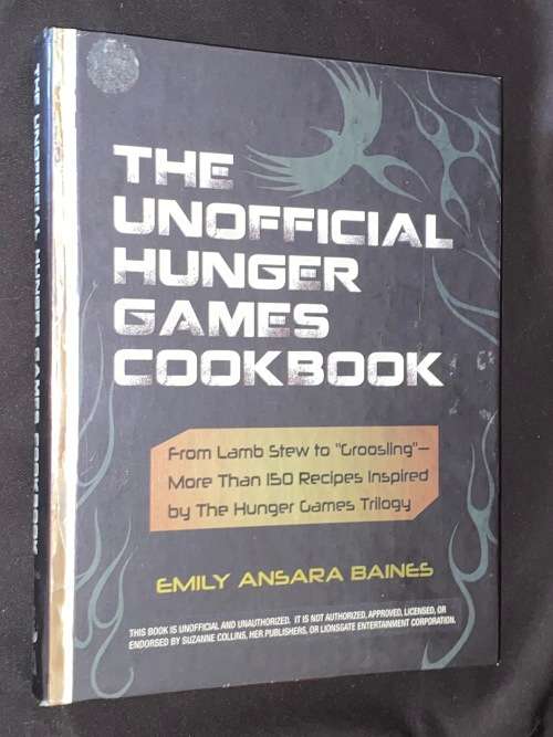 THE UNOFFICIAL HUNGER GAMES COOK BOOK BY EMILY ANSARA BAINES