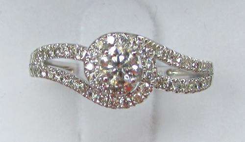 **SCINTILLATING [R35876]** EYE CLEAN [0.625ct] TWIST DIAMOND RING [2.456g] WHITE GOLD - BUY SAFE