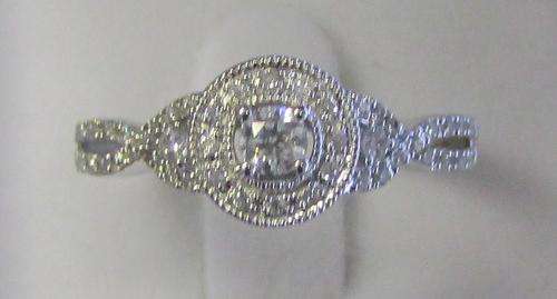 **HALO DESIGN [R34698]** EYE CLEAN [0.625ct] TWISTED DIAMOND RING [3.098g] WHITE GOLD - BUY SAFE