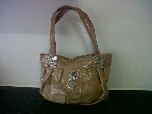 HANDBAGS IN BROWN