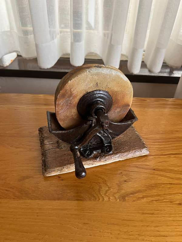 Antique HB&M hand crank grinder/sharpening wet stone wheel with water trough.