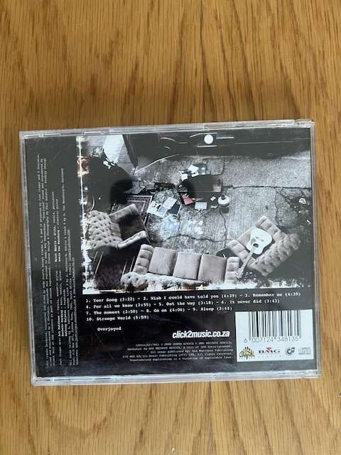 CD: Strange World. Just Jinger. 2000