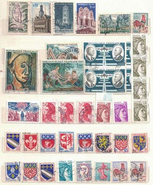 Stock Album with mint French Colonies and used France and other stamps