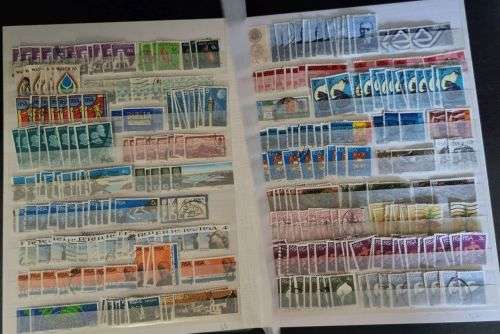 A4 Stock Album stacked with mostly used Union and RSA stamps