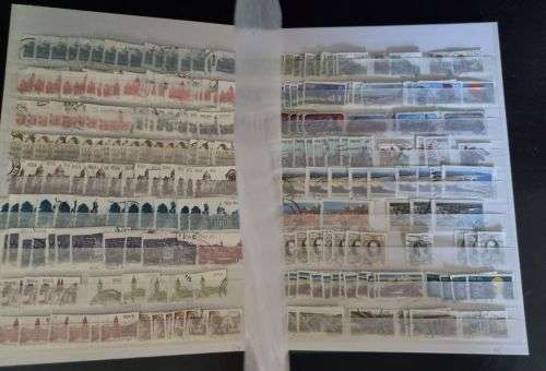 A4 Stock Album stacked with mostly used Union and RSA stamps