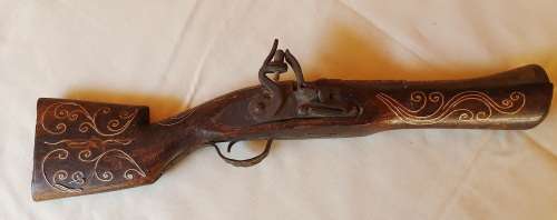 Antique flintlock pistol 1827