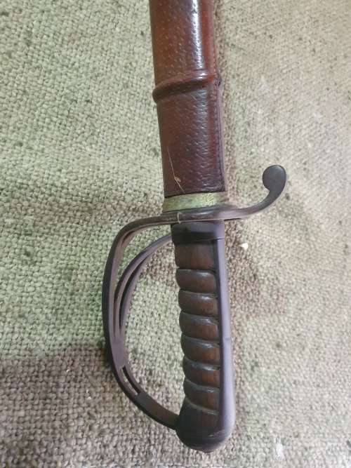 British 1845 Pattern Sword Wilkinson type blade with leather scabbard